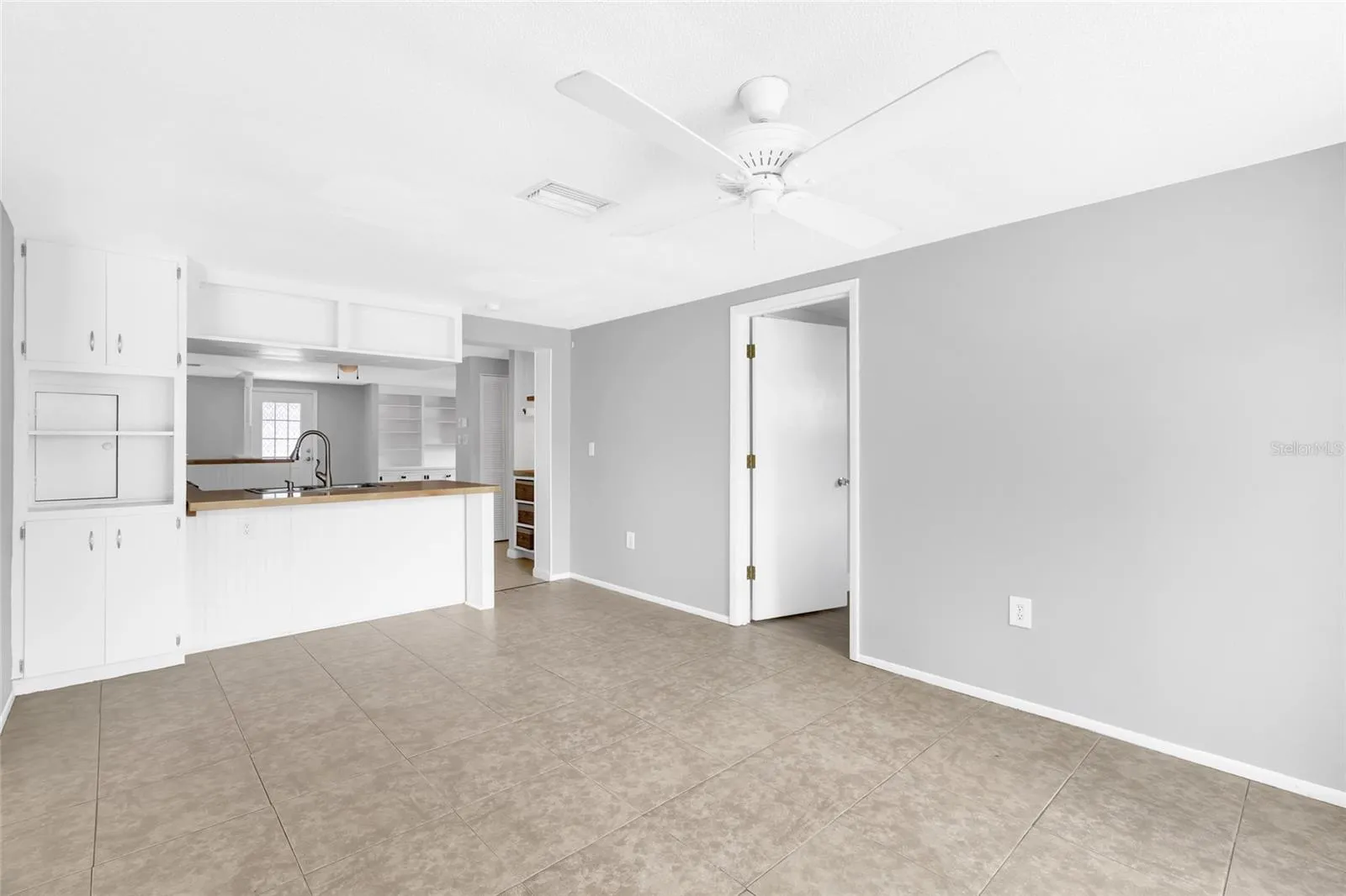 The kitchen opens directly to the family room, creating an easy everyday flow while keeping the spaces distinct.