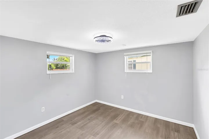 Bedroom 3 is bright and nicely sized, with two windows bringing in natural light and giving the room an open, airy feel.