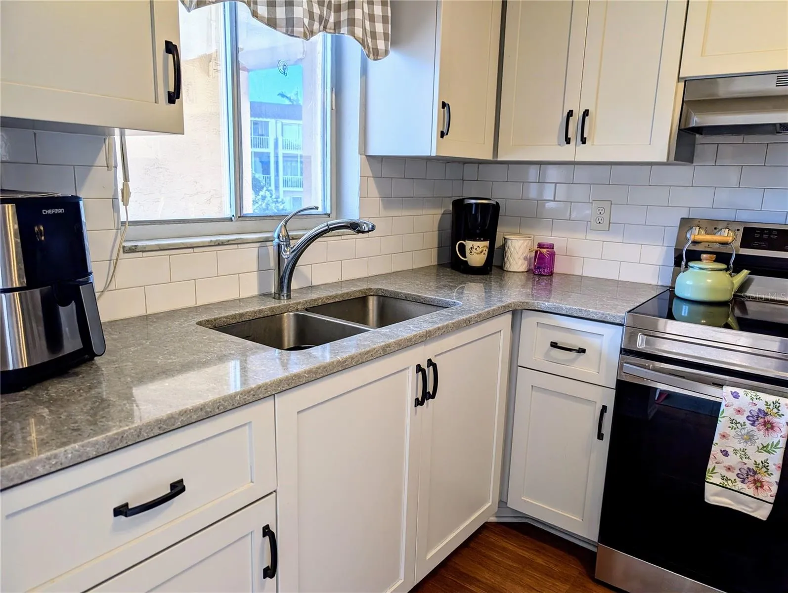 Quartz countertops, modern cabinetry...
