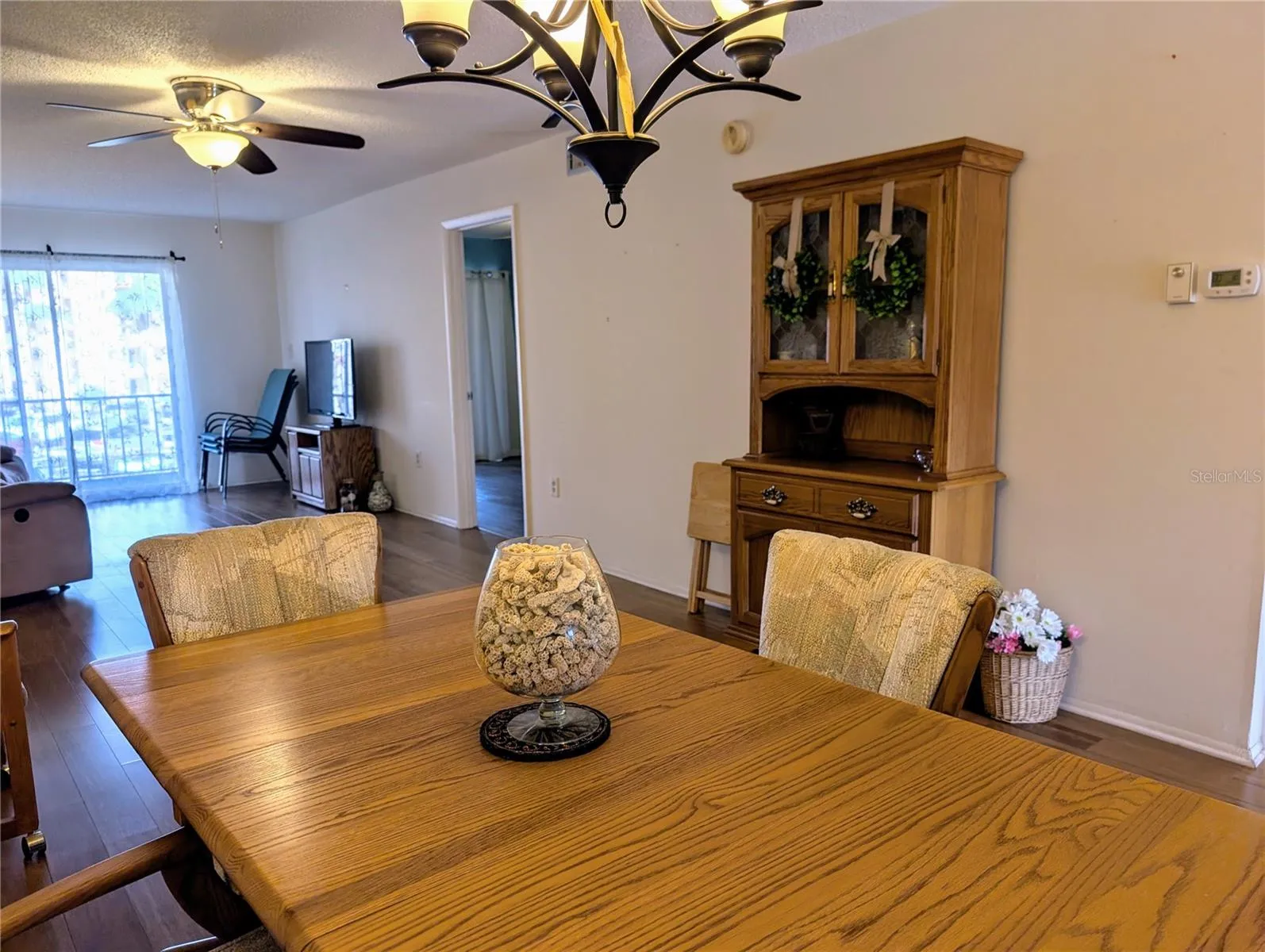 Upgraded lighting features &amp; fine ceiling fans in main and bedrooms.