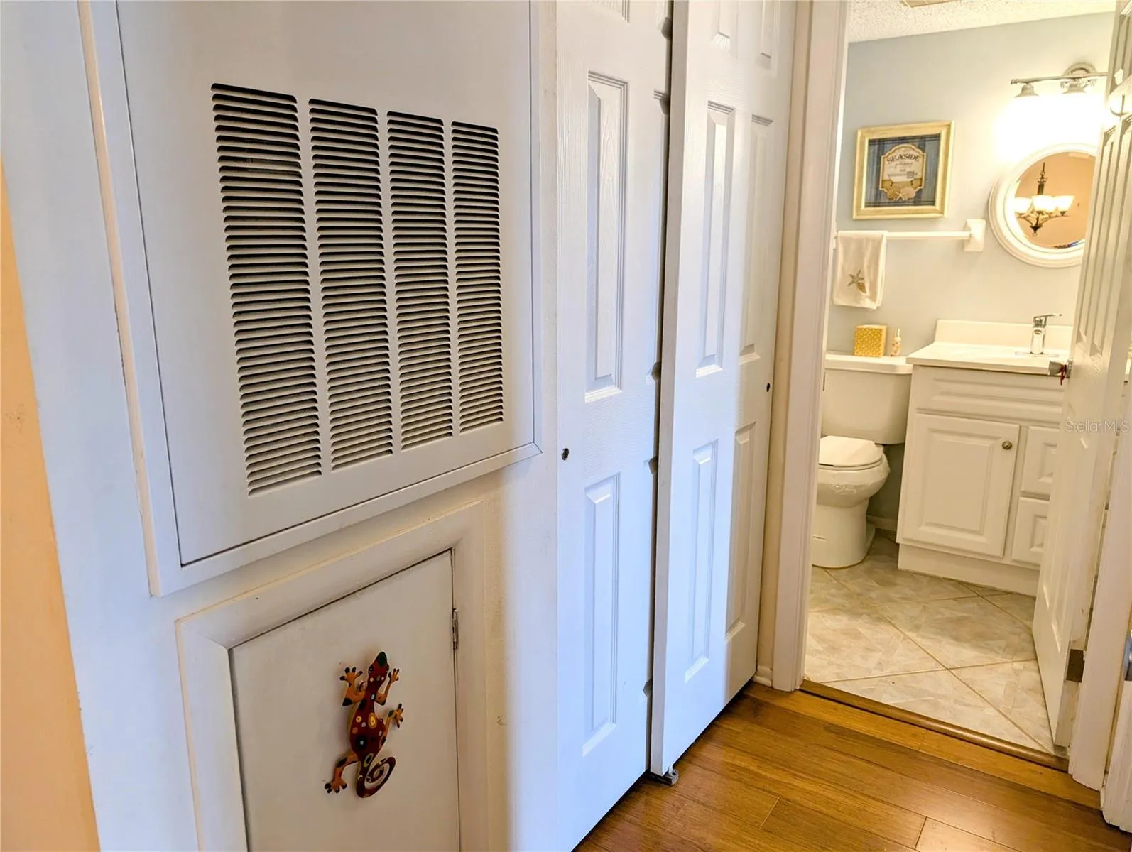 Hallway to 2nd bedroom/bathroom; updated all interior doors.