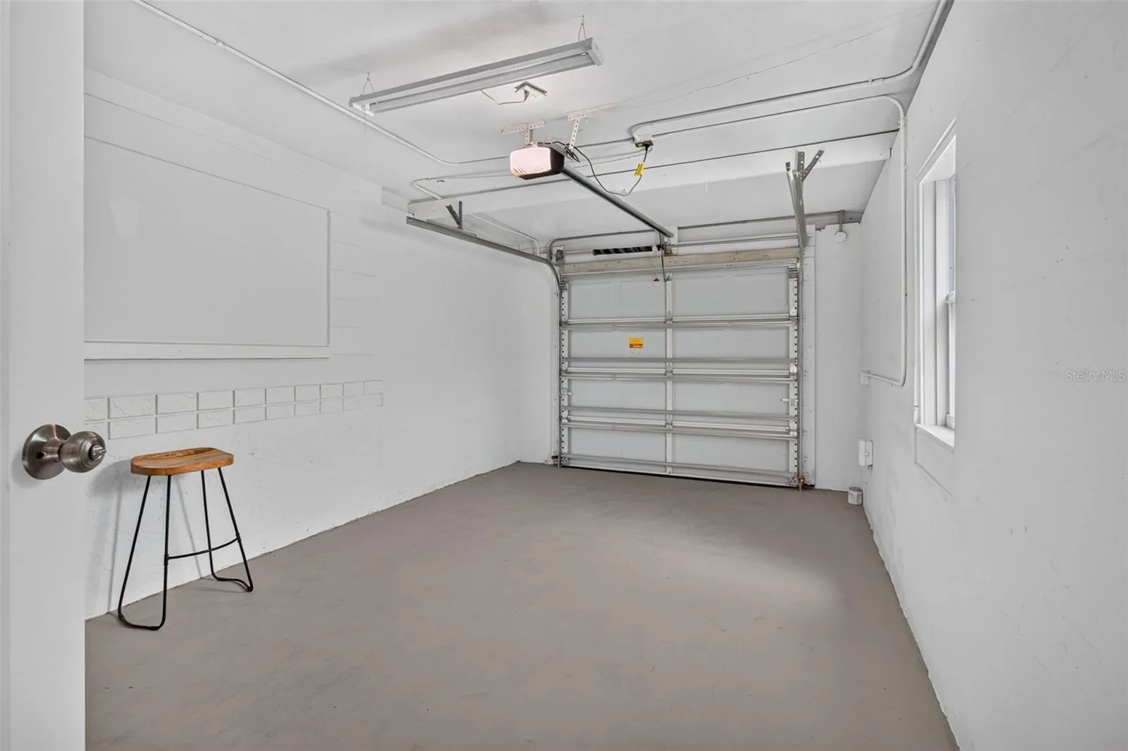 ONE CAR GARAGE / ENTRY THROUGH DINING ROOM