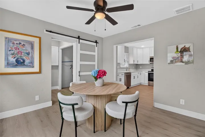 DINING ROOM WITH NEW CEILING FAN