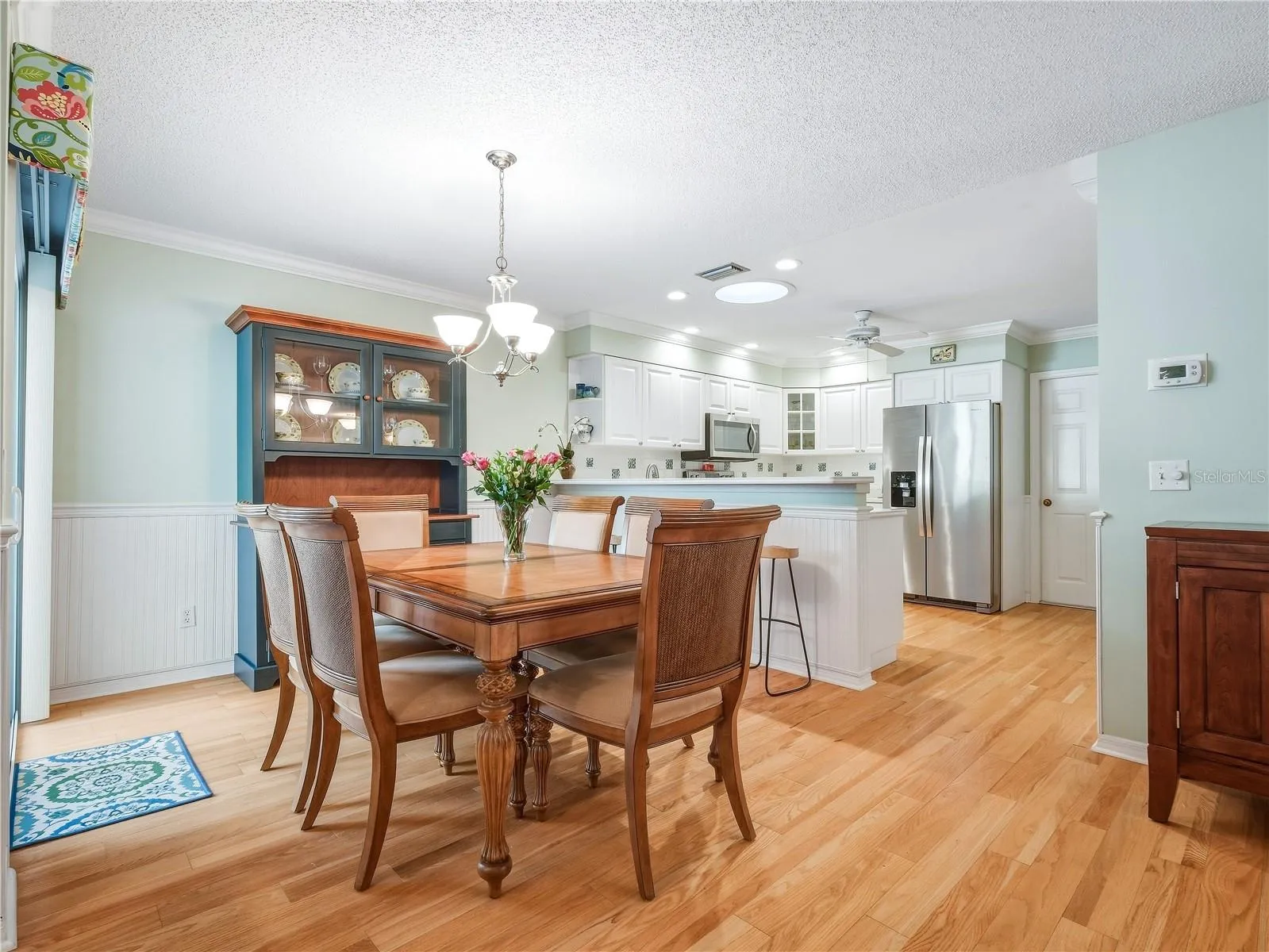 Dinning room with sliders to outdoor patio for ease of entertaining.
