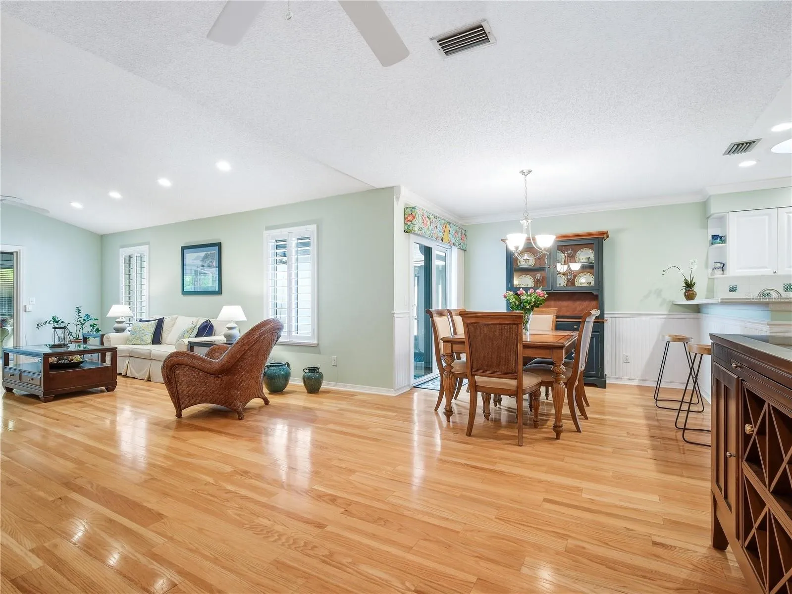 Spacious floor plan with gleaming Hardwood floors.