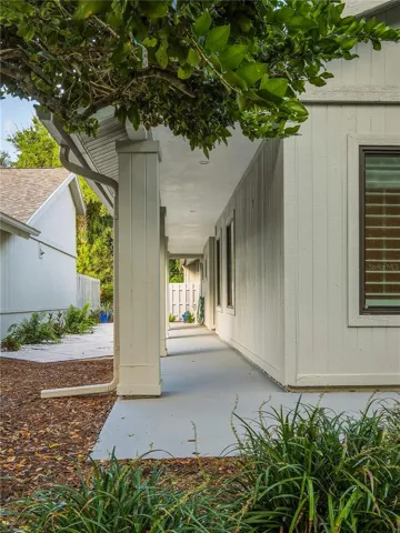 Side entrance with patio