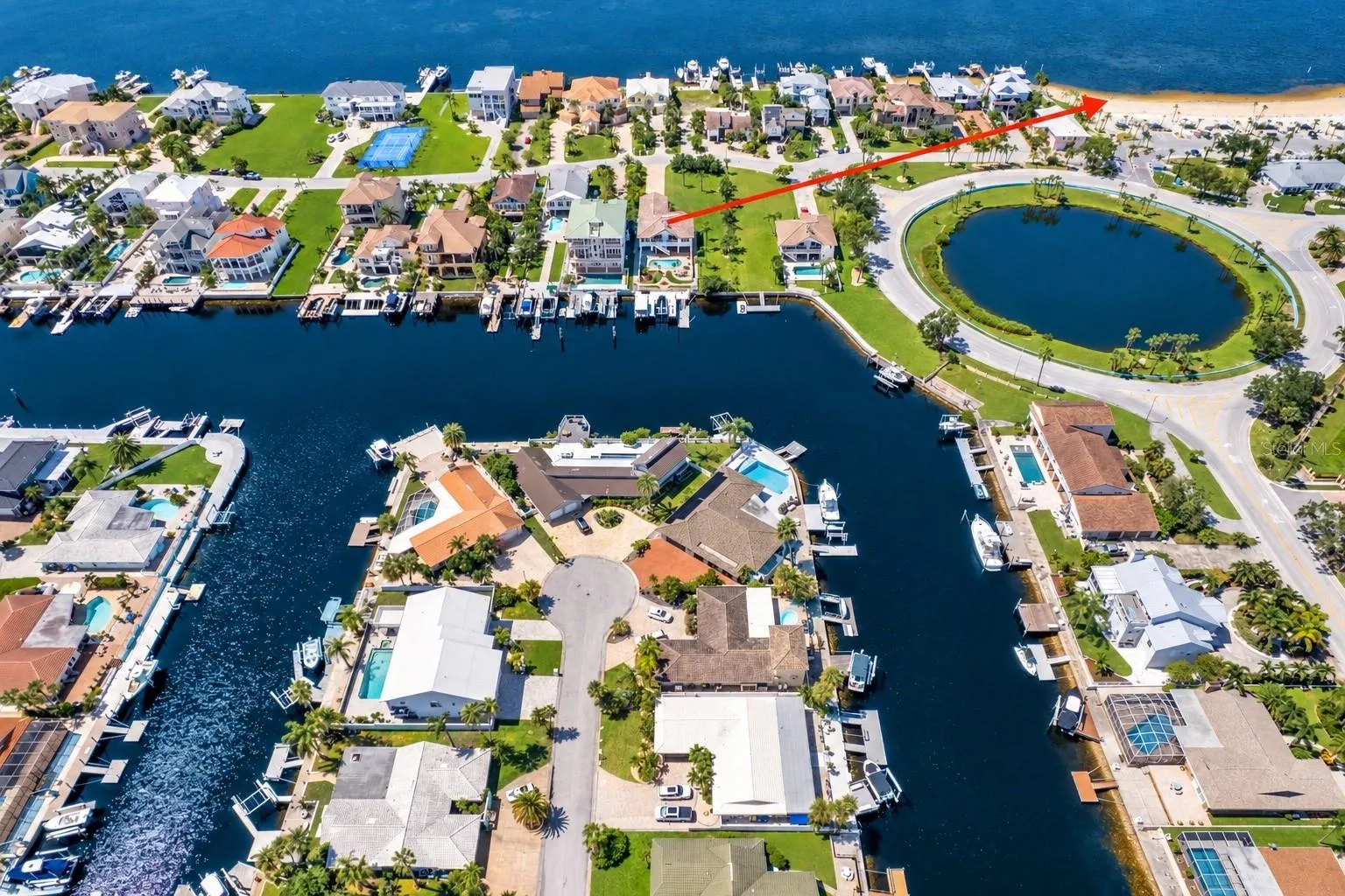 Aerial of Gulf Harbors canals. Easy walk to the Gulf Harbors Beach Club.