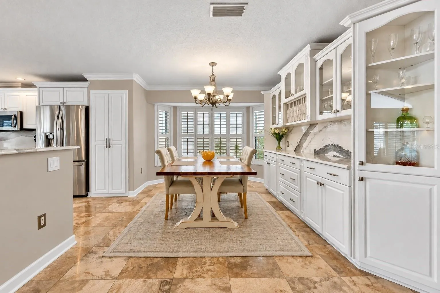 Dining room with built-in cabinetry.