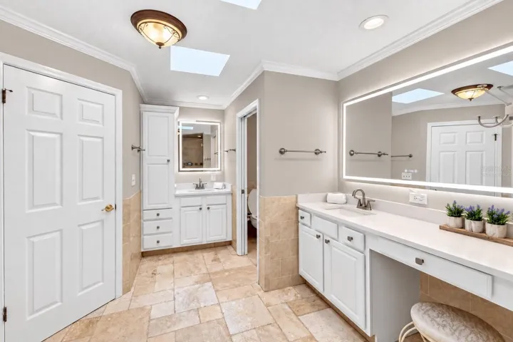 Primary bath vanity with quartz counters.