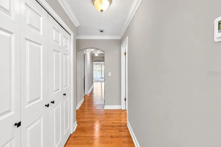 Upstairs hallway with linen closets.