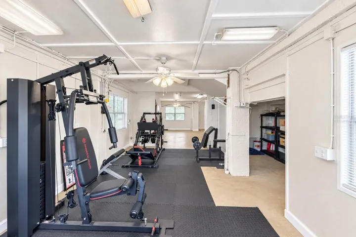 Home gym and storage area. Virtually staged – personal items digitally removed.