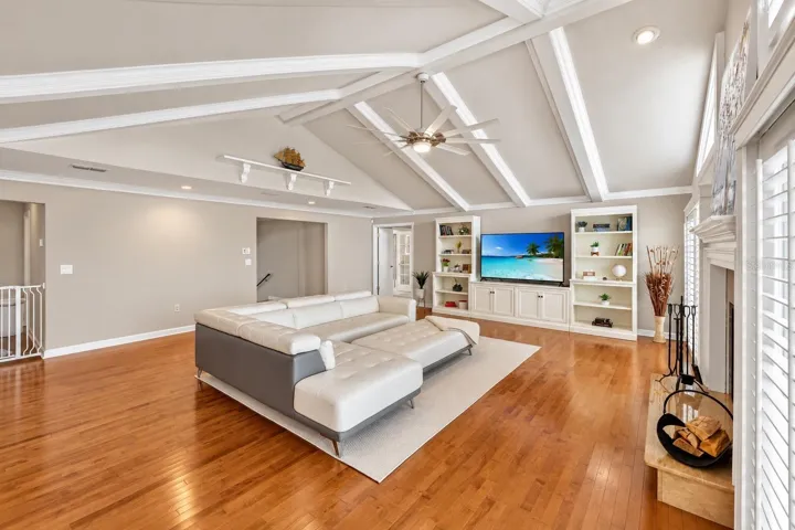 Great room with custom built-ins and TV wall.
