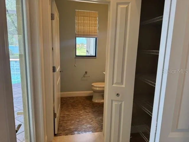 Pool Bath hall with storage closet
