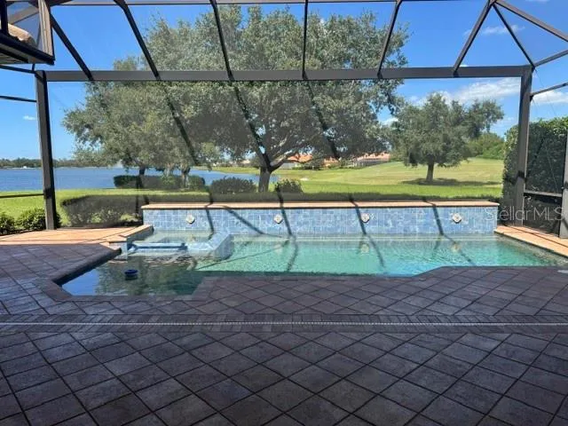 Salt water heated pool with water feature