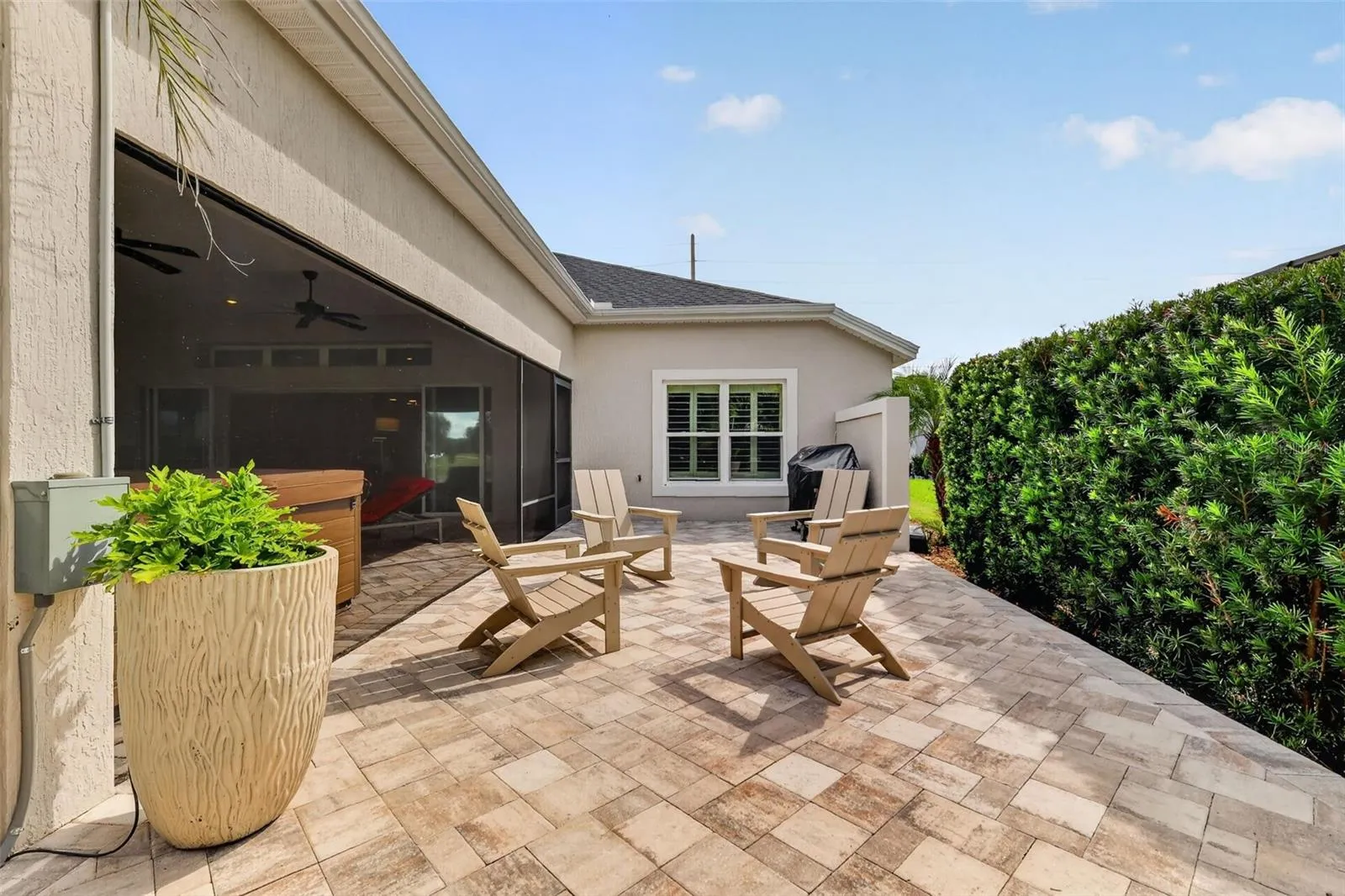 Adjacent outdoor paver patio