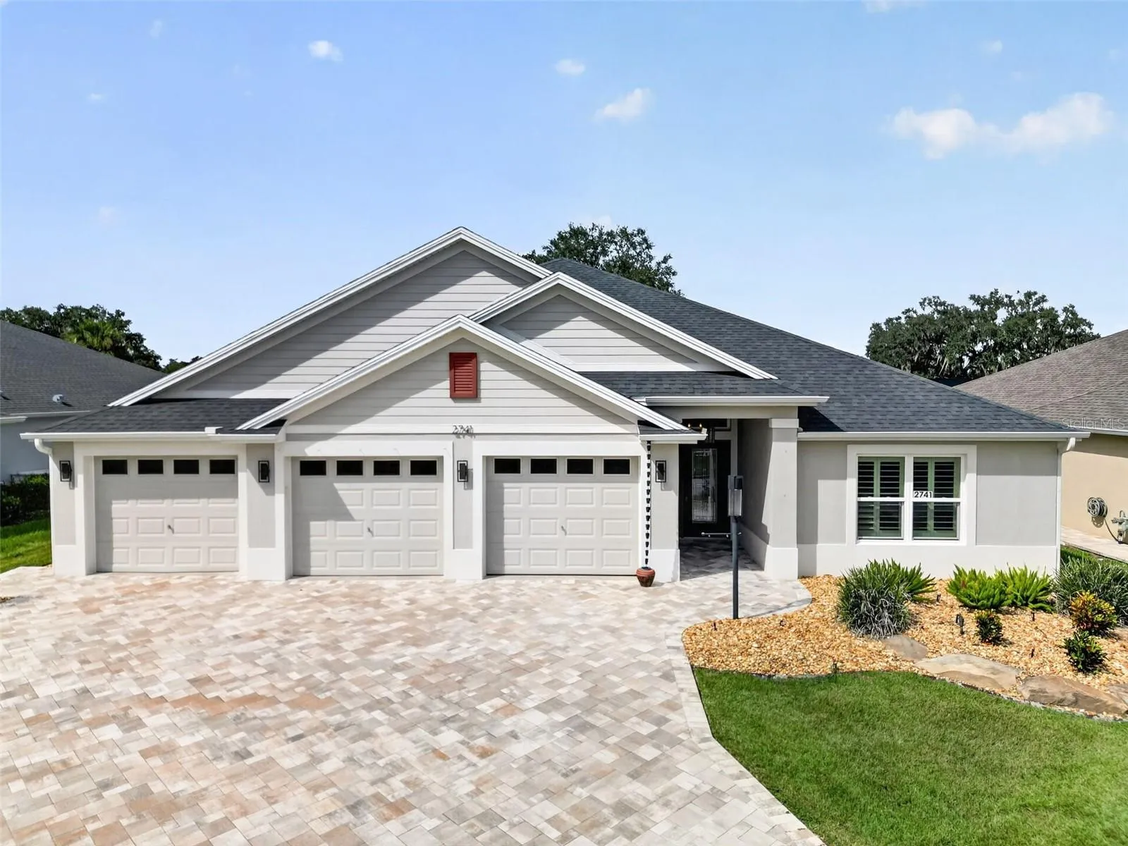 3 Stall Garage with a large driveway