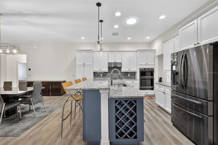 Kitchen with granite counters and stainless steel appliances