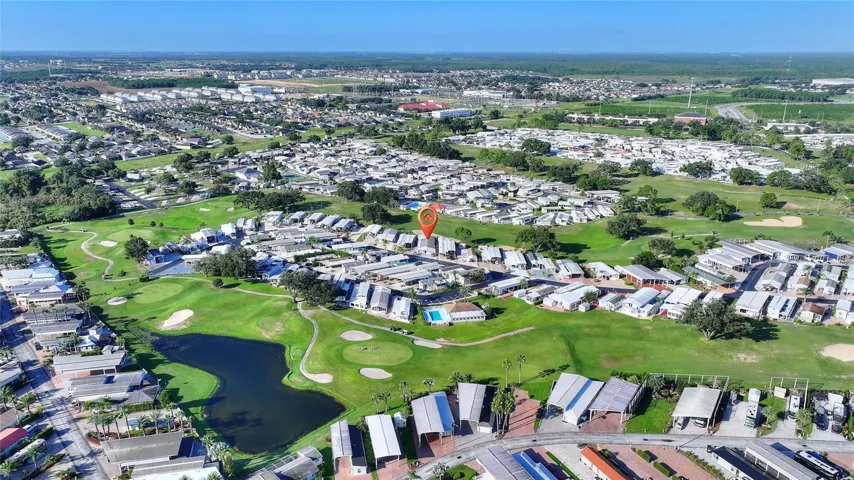 Aerial view back to golf course close to clubhouse