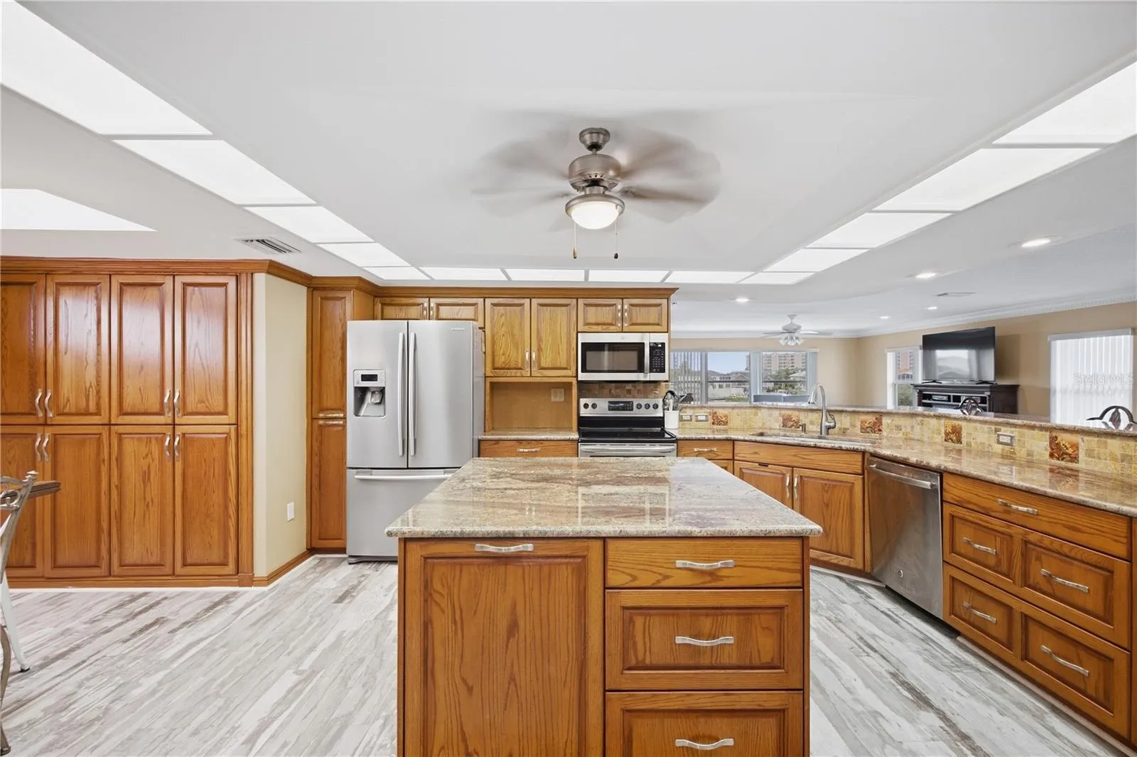 spectacular kitchen with real wood custom cabinets, tons of custom storage, and roll out drawers.