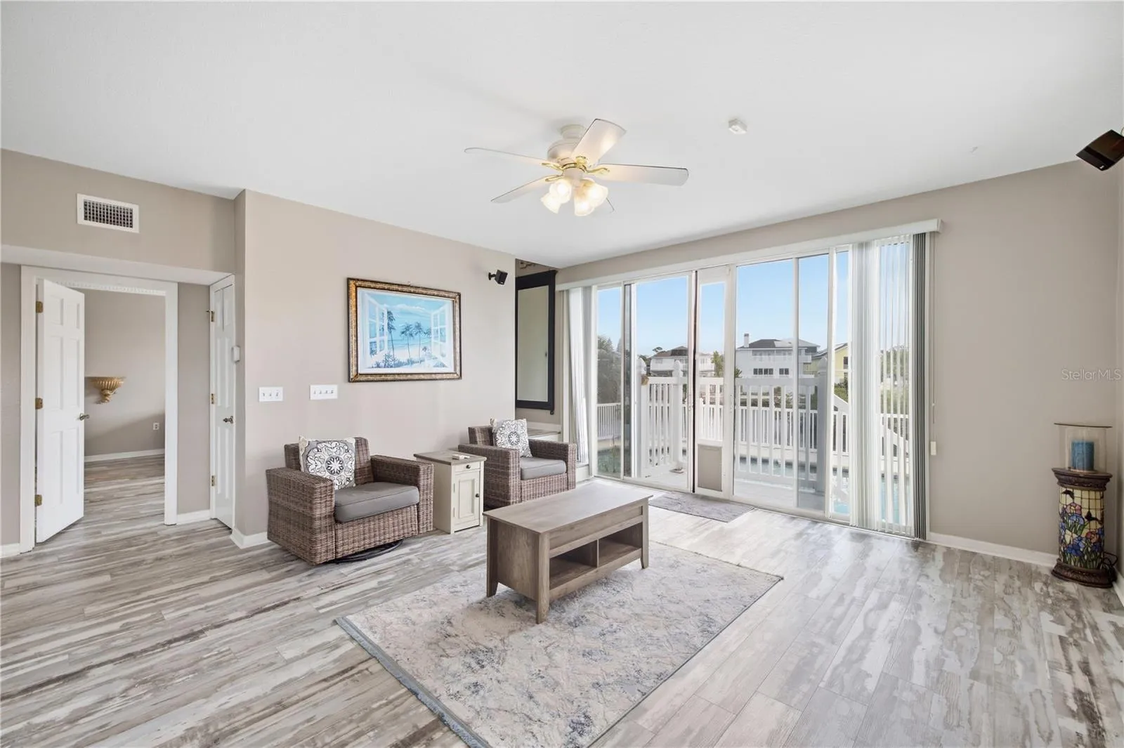 Den downstairs with wood burning fireplace nad additional entrance/exit.