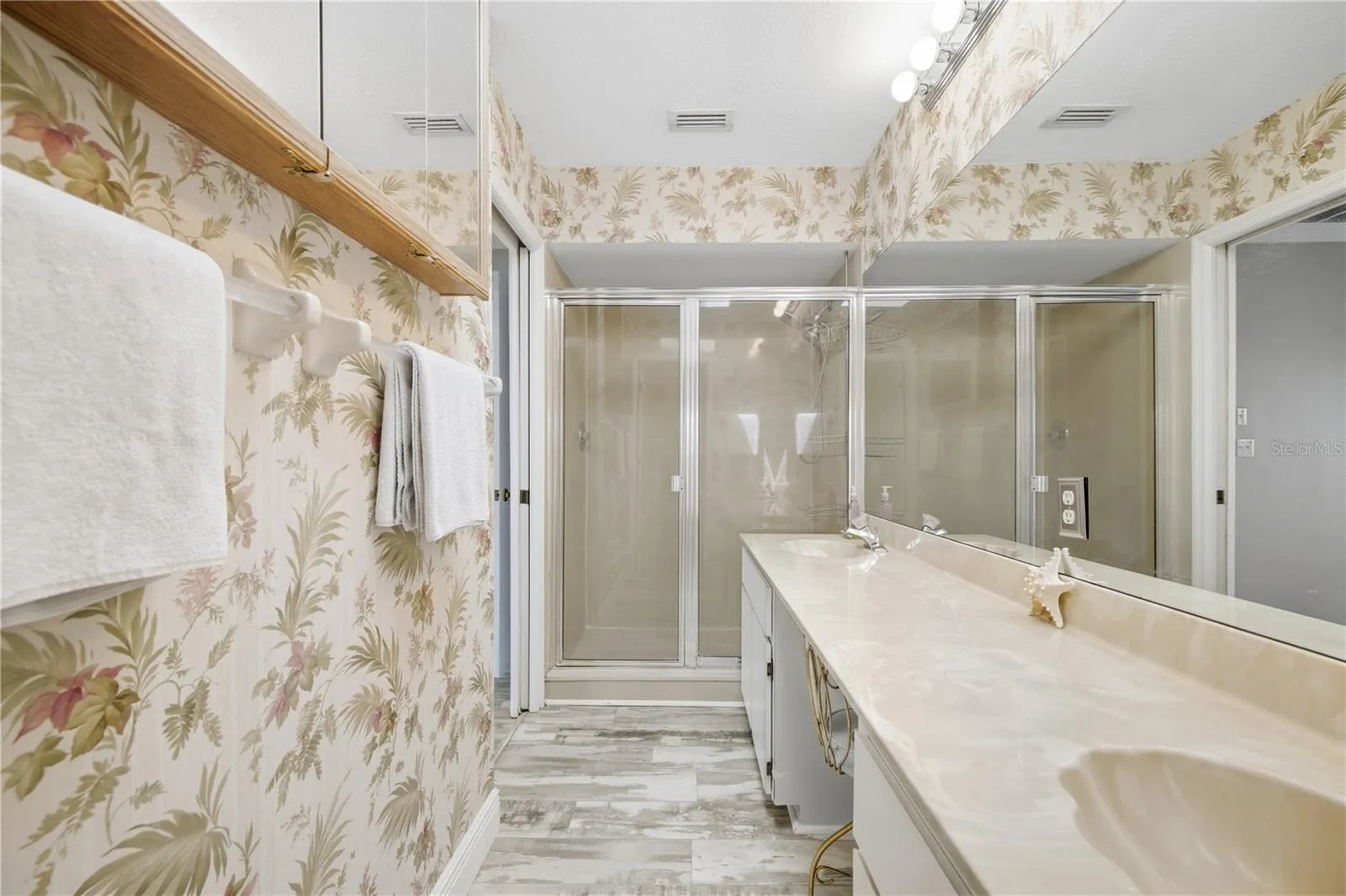 Double Vanity, Walk in Shower and space to be completely redesigned if you should choose!