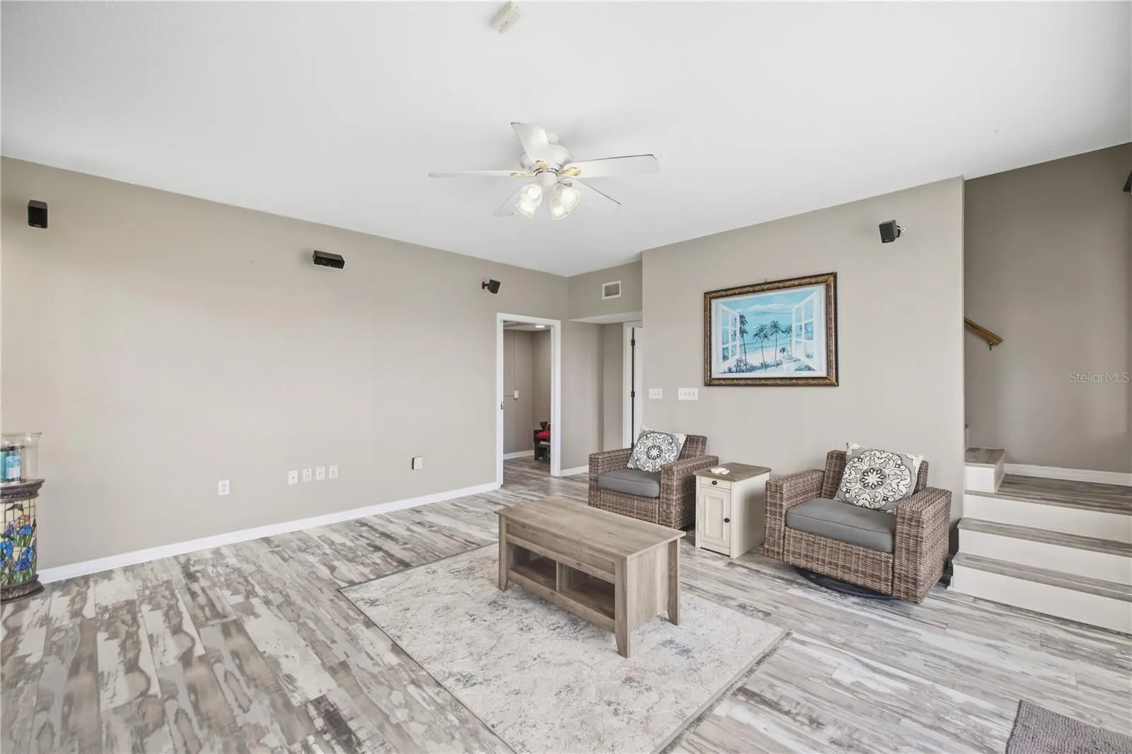 Den downstairs with wood burning fireplace nad additional entrance/exit.