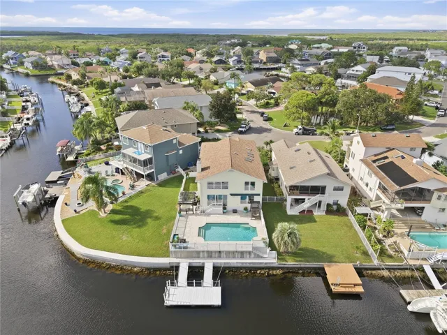 Near Corner Edge Lot with Waterfront living- equipt with the Dock, the Pool, the Space and MORE!