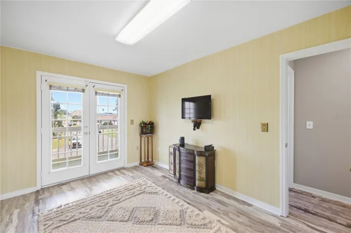 Bedroom 2 Upstairs - also has access to the front Juliette Balcony shared between bedroom 1 and 2!