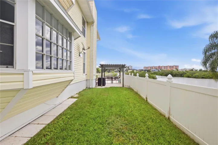 Side Yard and fencing along the side.