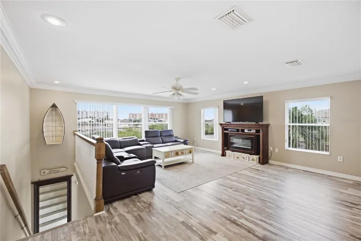 One of TWO Living Room/Den spaces in the home! TONS of natural light