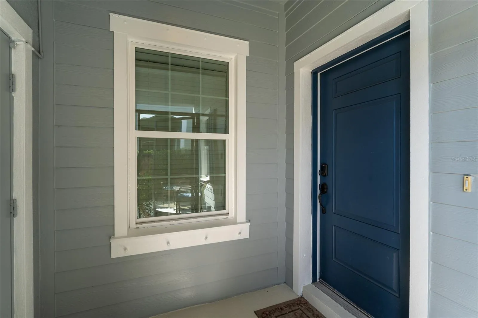 Covered & Screen Enclosed Entryway to  Home