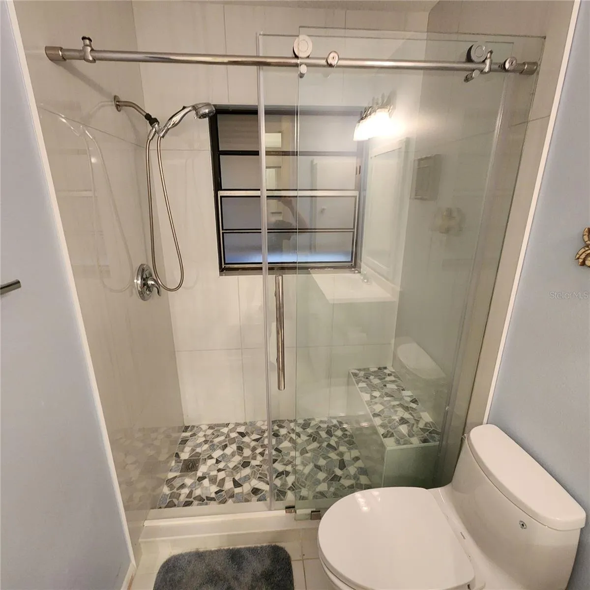 wall tile goes floor to ceiling