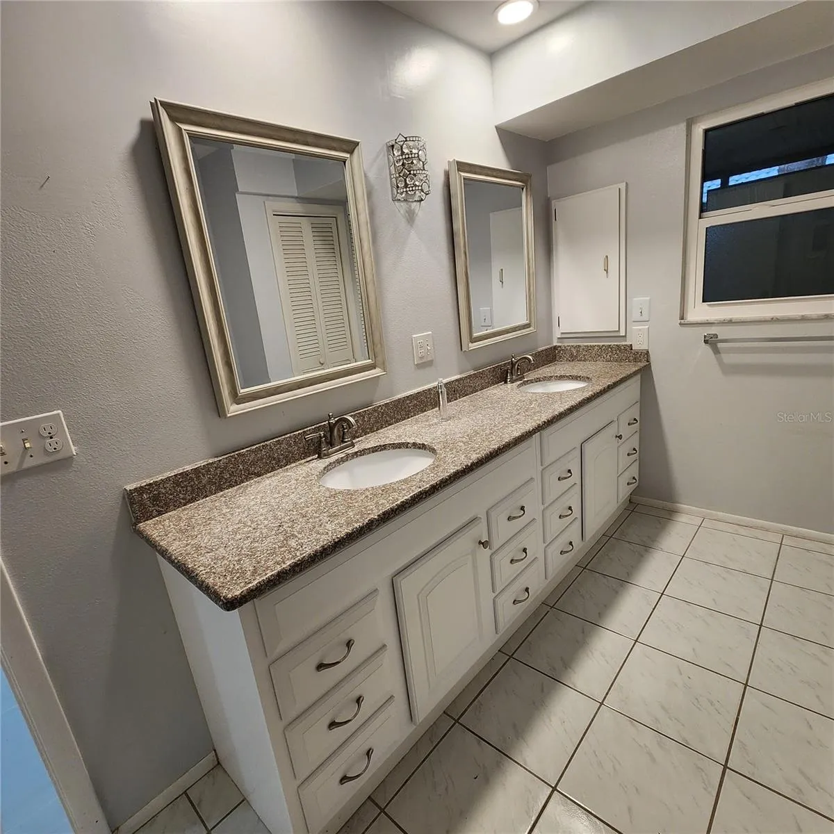 primary bath vanity and impact window