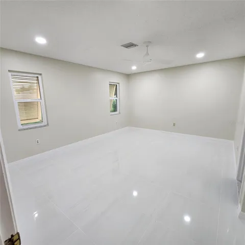 Beautiful Kitchen recessed lighting and under cabinet lighting. Ceiling fan