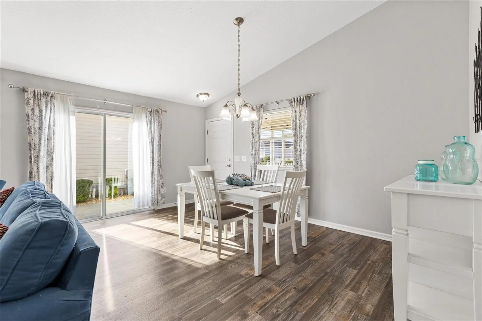 Dining Room w/ Sliding Door Access to Side Patio.