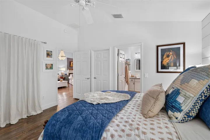 Primary Bedroom with En-Suite Bath and Walk-In Closet
