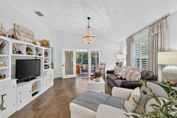 Living Room with View to the Enclosed Lanai