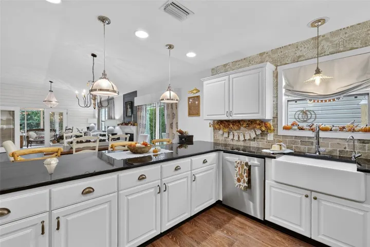Generous Breakfast Bar Opening to Dining and Living Room