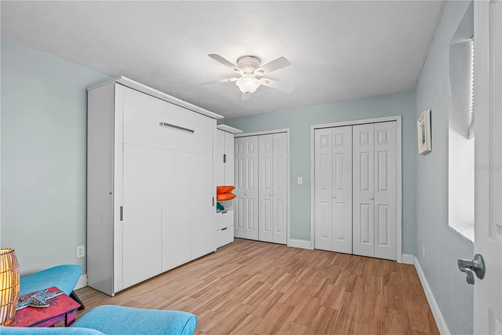 1st floor- Private entrance- 2nd bedroom with Murphy bed and closets -view 2