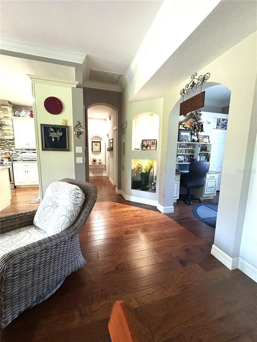 looking out from primary bedroom door toward office and additional bedrooms