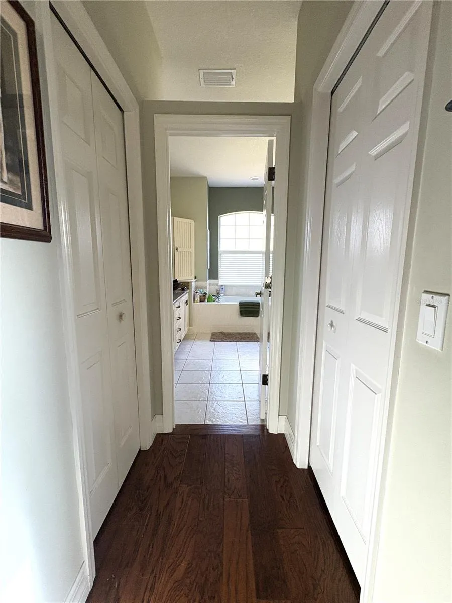 Primary ensuite with 2 walk in closets