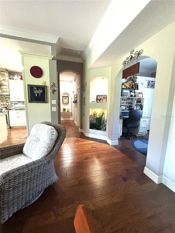 looking out from primary bedroom door toward office and additional bedrooms
