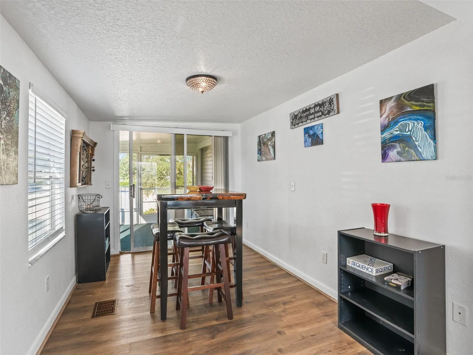 View of back section of BONUS ROO / FLEX SPACE - Note SLIDING GLASS DOOR access to SCREEN ENCLOSED LANAI.