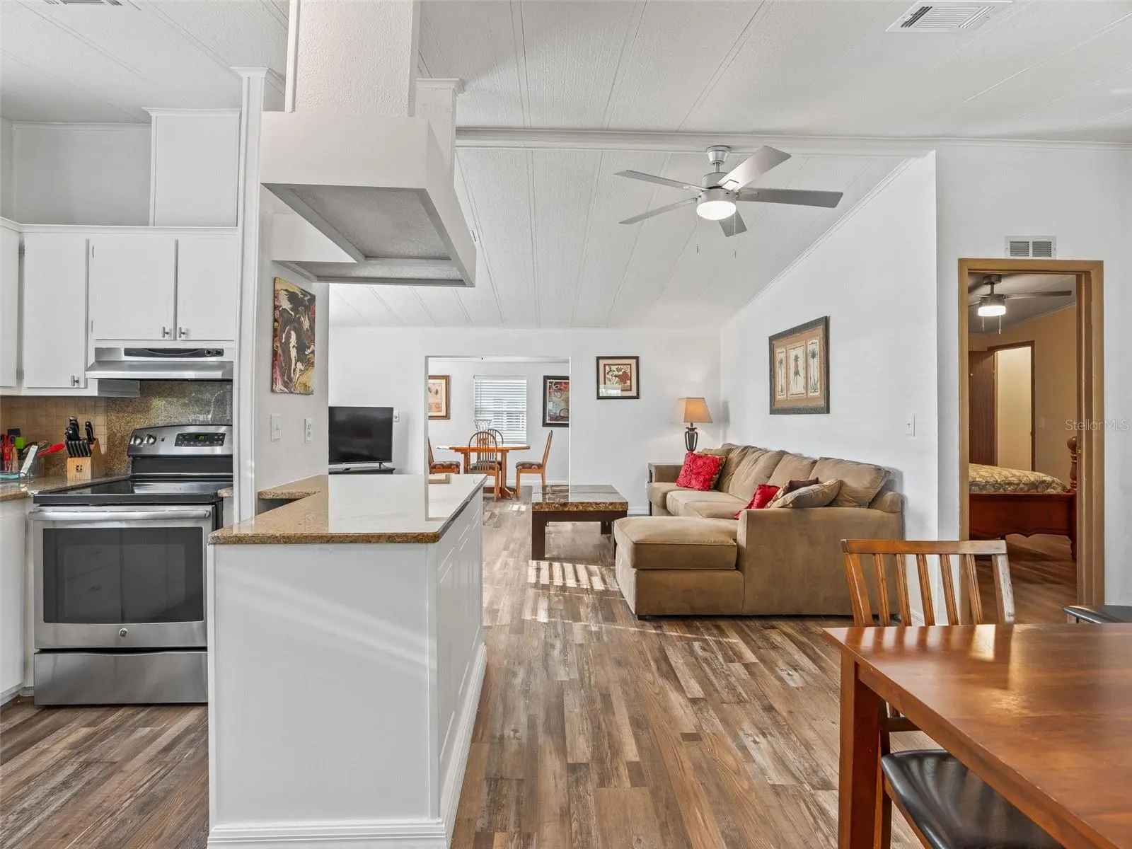 View from FRONT DOOR - KITCHEN (L), DINING ROOM (R) &amp; LIVING ROOM (back Center).