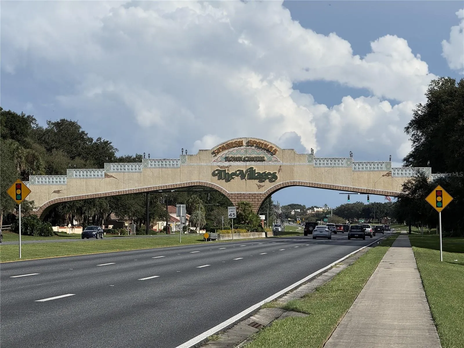 View of recently renovated VILLAGES GOLF CART BRIDGE across US HWY 441/27 - Note SPANISH SPRINGS TOWN CENTER is located on the west side of bridge (R turn at stoplight past the bridge).