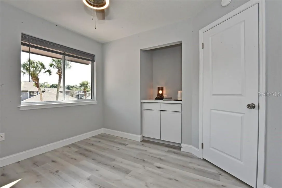 Bedroom #2 (11x11). All interior doors have been replaced with new modern two panel doors with new hinges and brushed nickel door handles.