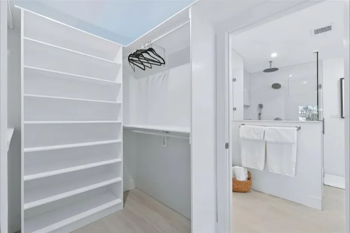 primary bedroom - 1 of 2 walk in closets
