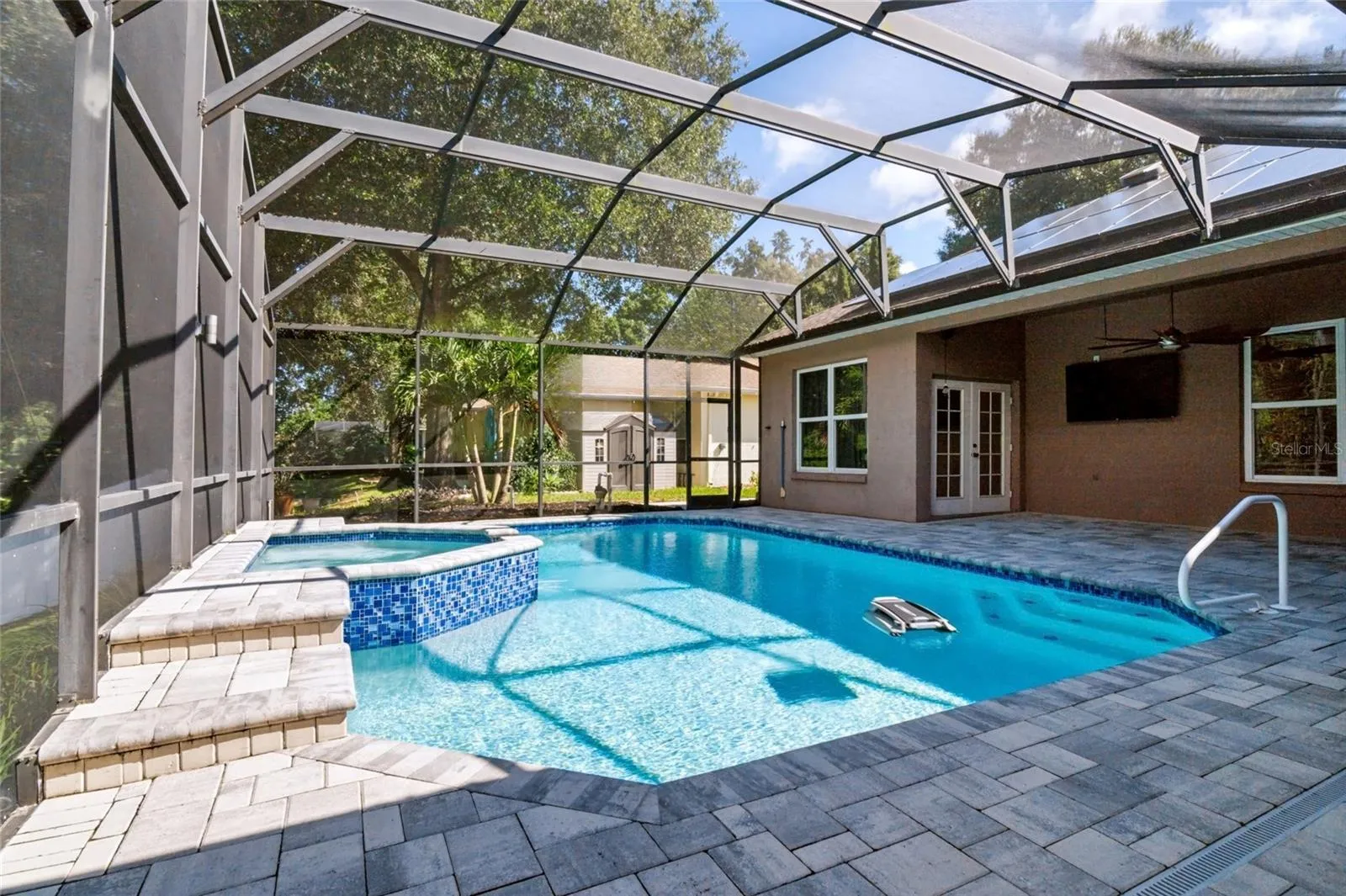 Private pool with robotic skimmer