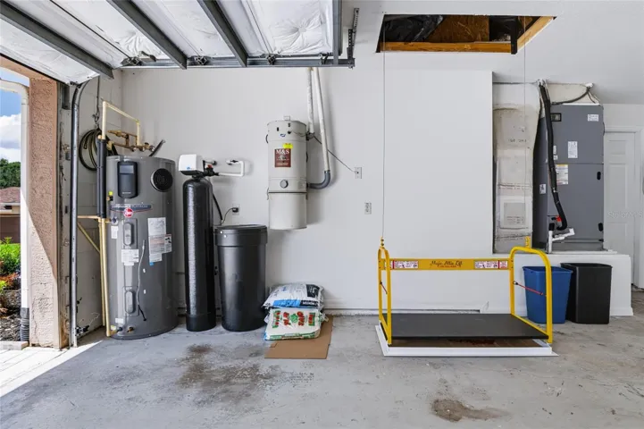 Double Garage/ water heater, central vac, water softener, electric elevator to attic