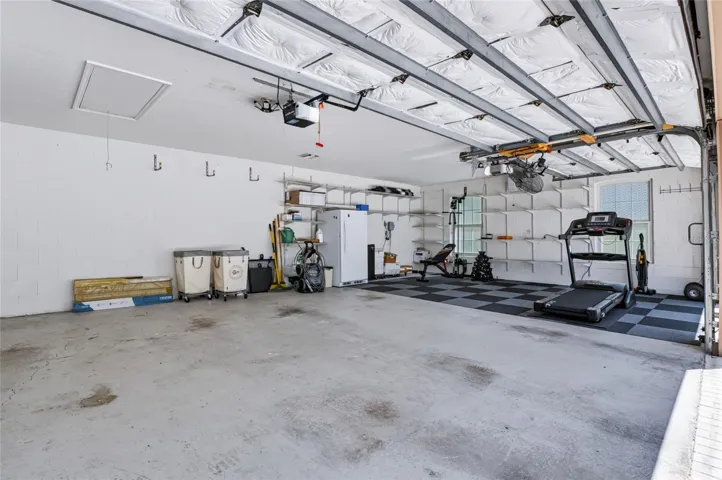 single garage with freezer, treadmill and weights (staying with home)